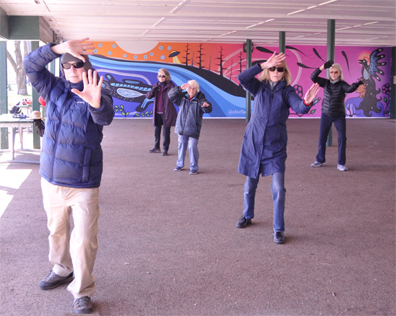 Tai Chi under the Boathouse roof at Kew Beach